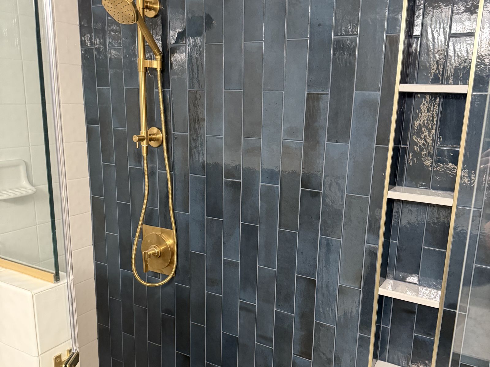 Tile niche and brass shower system